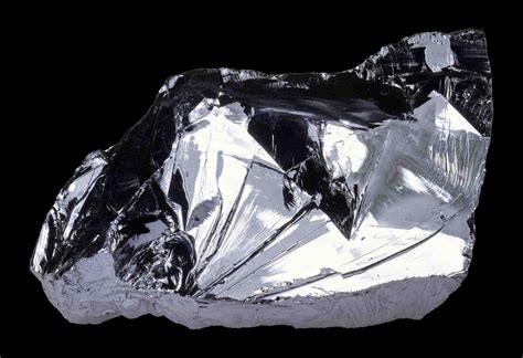 Silicon (Si) .